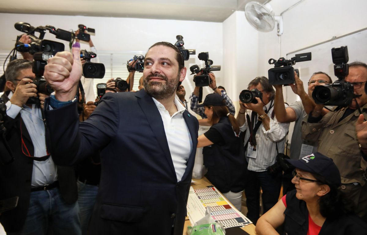 Lebanese Prime Minister Saad Hariri gives a thumbs-up to journalists after voting at a polling station in Beirut on May 6th, 2018.