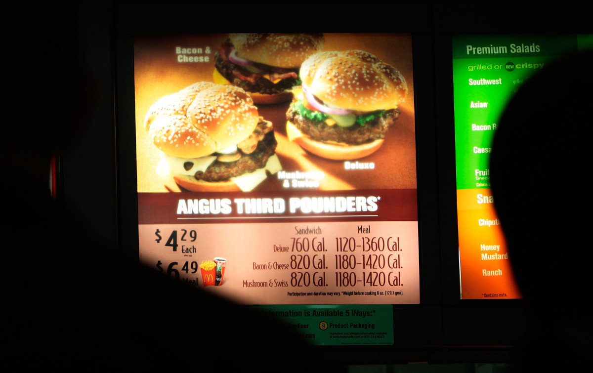 Calories are listed next to menu items in a McDonald's on July 18th, 2008, in New York City.