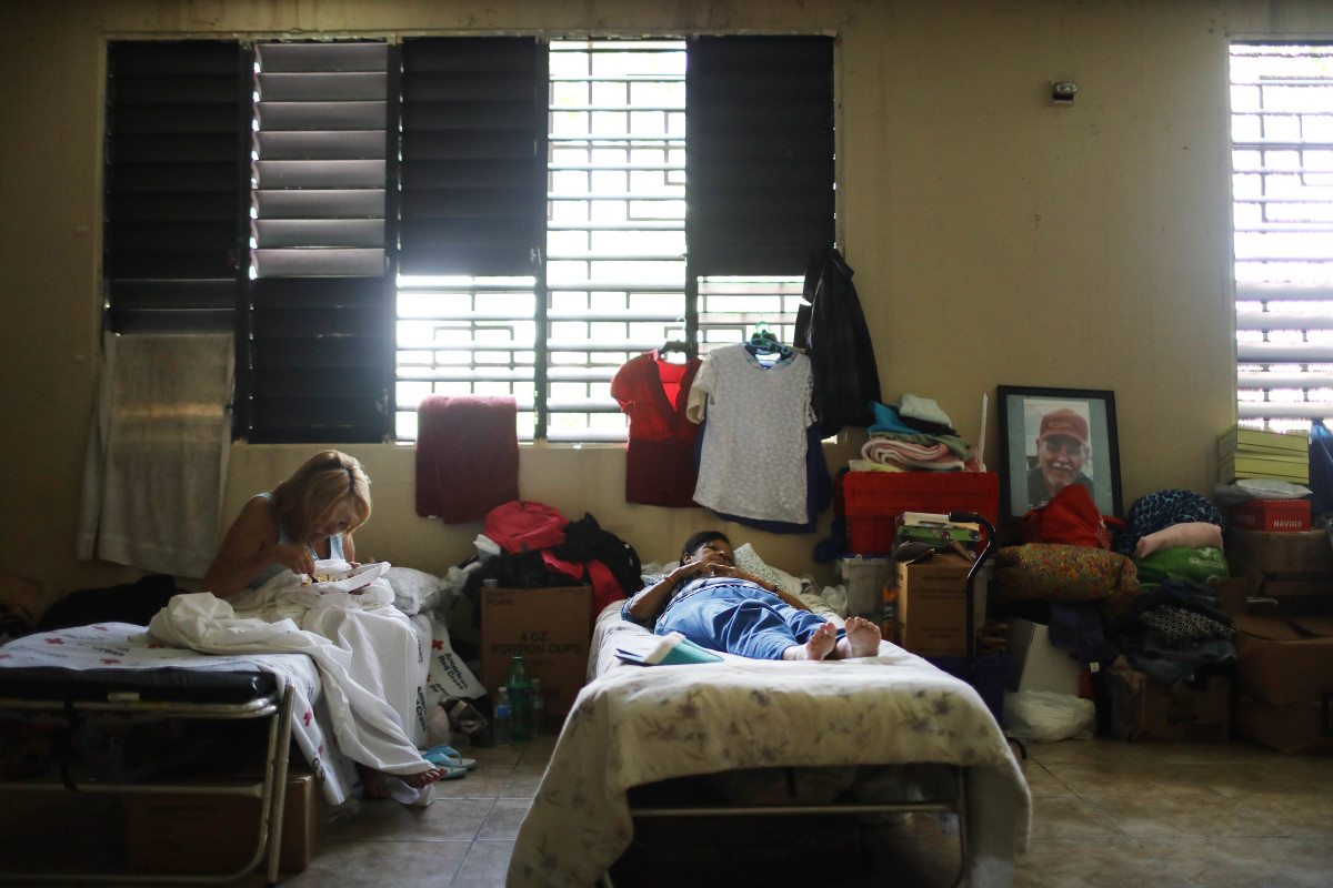 Two women rest in a shelter for Hurricane Maria victims in in Toa Baja, Puerto Rico, on December 25th, 2017.