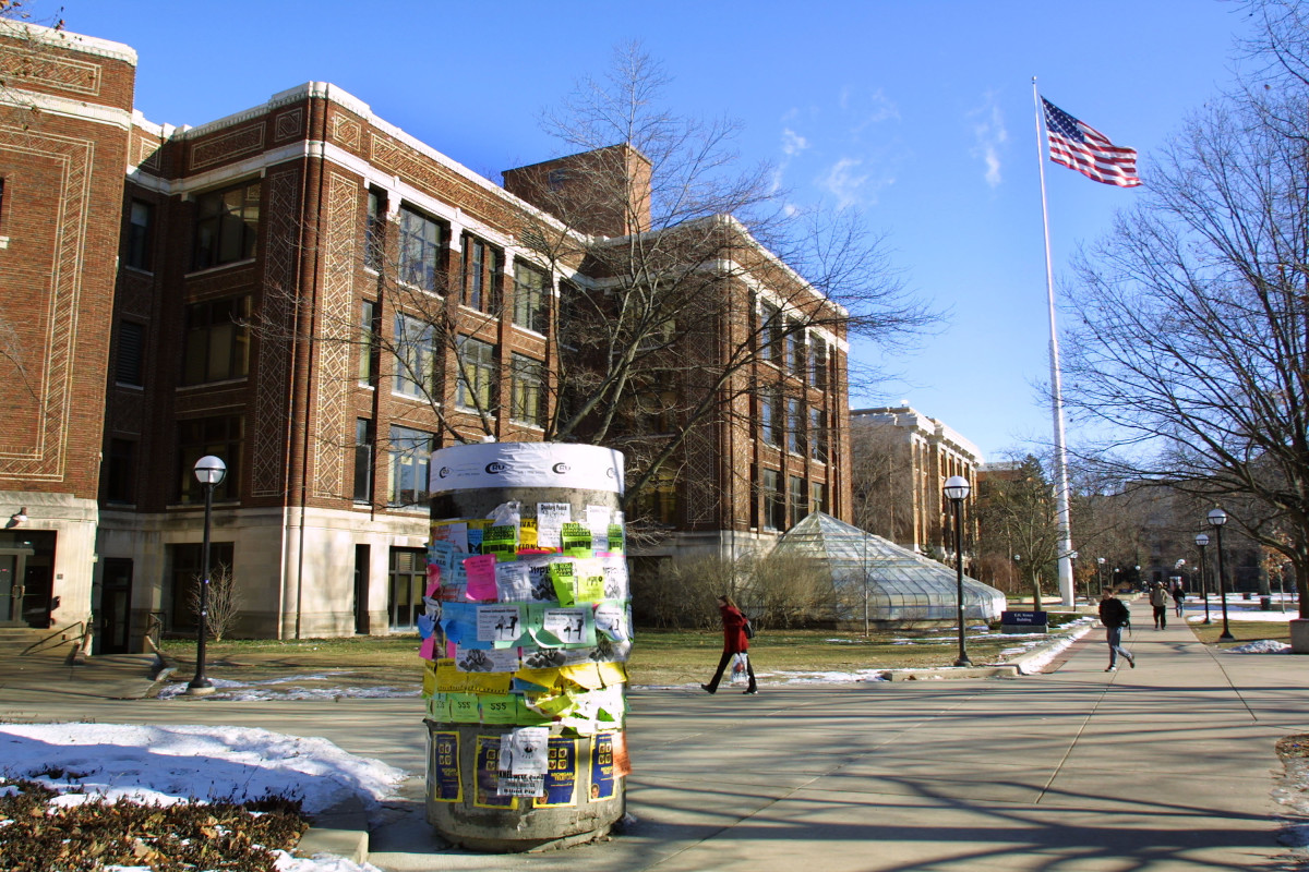 Students walk across the University of Michigan campus in Ann Arbor, Michigan.