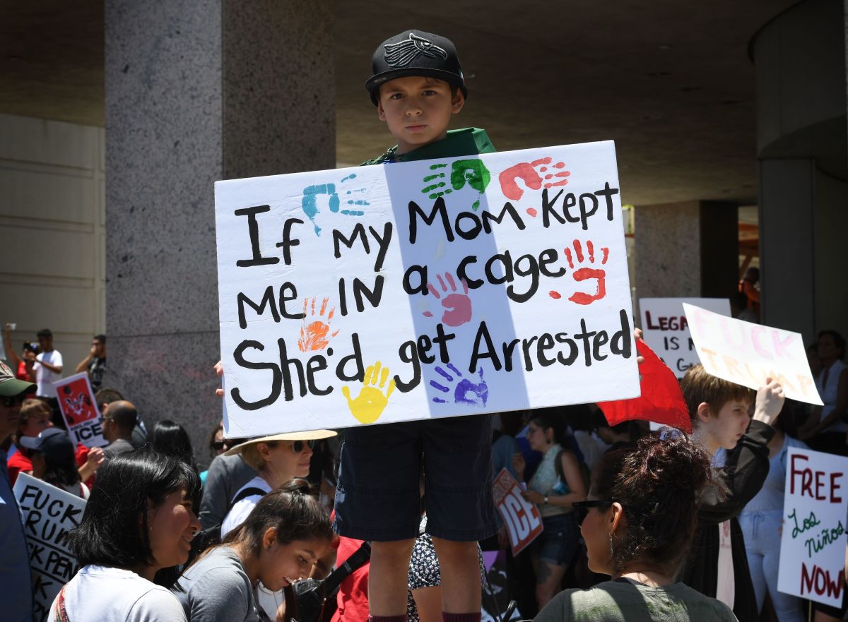 A young protester takes part in a march against the separation of immigrant families on June 30th, 2018, outside of an Immigration and Customs Enforcement detention facility in Los Angeles, California.