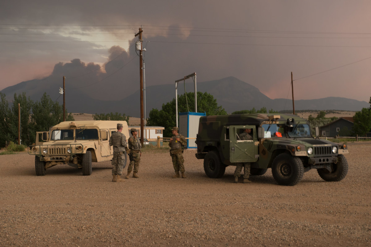Colorado National Guard members provide roving security patrols, to assist with the enforcement of road closures due to the Spring Creek Fire in Huerfano County on July 4th, 2018.