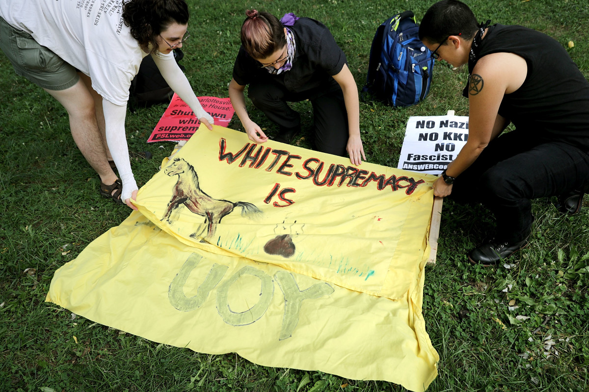 Antifascist demonstrators prepare signs for their counter-protest to the Unite the Right rally in Washington, D.C., on August 12th, 2018.