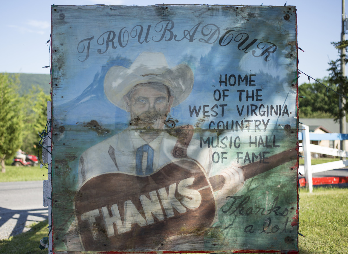 A sign outside the Troubador, a honky-tonk in Winchester, Virginia.