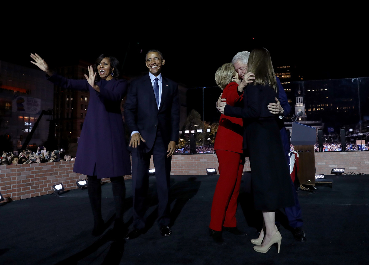 Michelle Obama, Barack Obama, Hillary Clinton, Chelsea Clinton, and Bill Clinton greet supporters during a campaign rally on Independence Mall on November 7th, 2016, in Philadelphia, Pennsylvania.