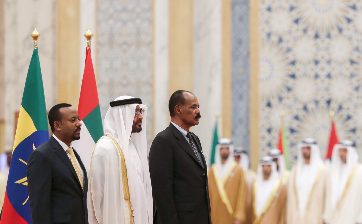 Abu Dhabi's Crown Prince Sheikh Mohamed bin Zayed Al Nahyan (C) receives Ethiopian Prime Minister Abiy Ahmed (L) and Eritrean President Isaias Afwerki (R) at the presidential palace in the United Arab Emirates capital of Abu Dhabi on July 24th, 2018.