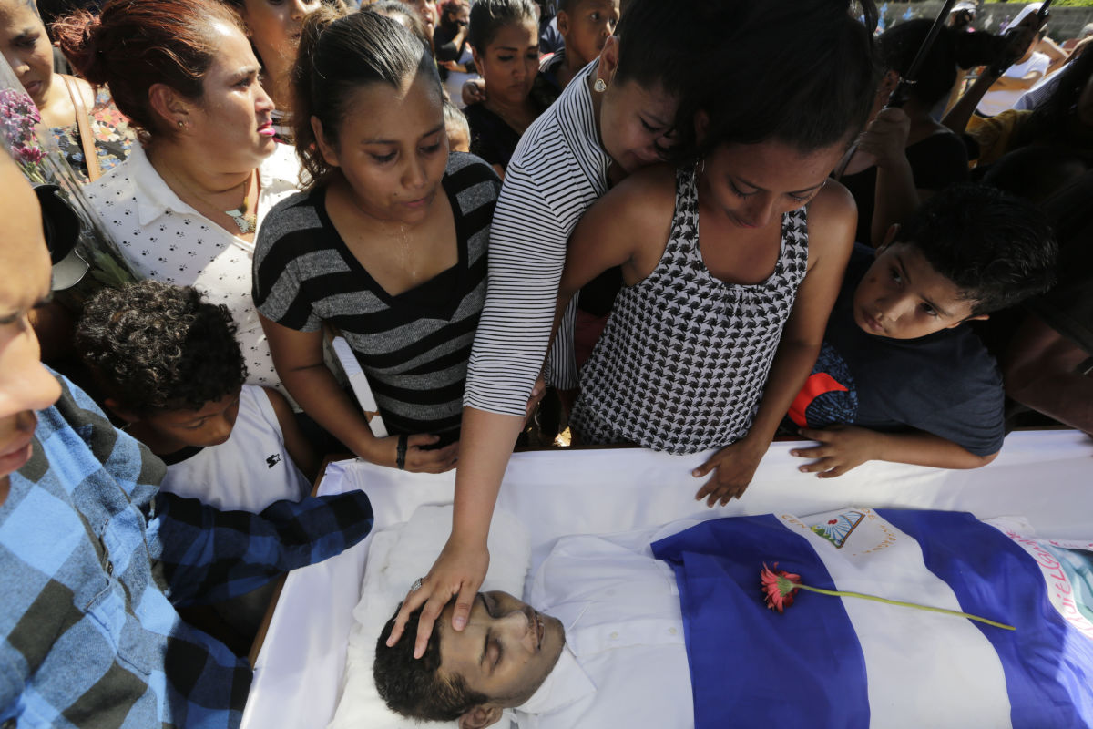 Relatives and friends mourn during the funeral of 26-year-old Ezequiel Leiva, who died in the hospital three months after being injured during anti-government protests, on September 18th, 2018, in Managua, Nicaragua. More than 300 protesters were killed in Nicaragua during months of unrest following demonstrations against President Daniel Ortega's government.