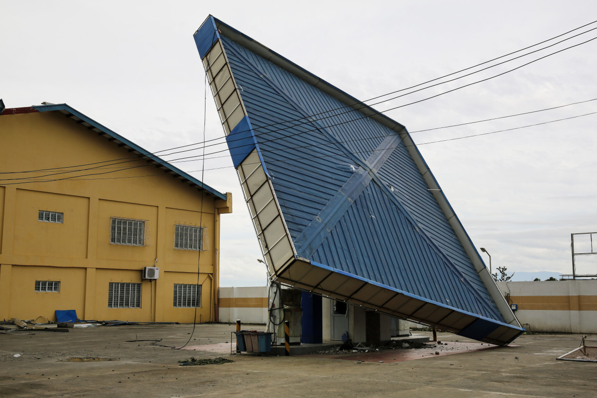 A petrol station lies toppled in Tuguegarao, Cagayán.