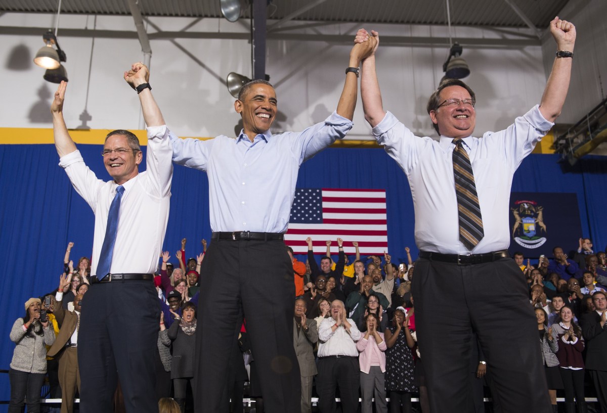U.S. President Barack Obama arrives to speak at a Democratic campaign rally for U.S. Senate candidate Gary Peters (R) and candidate for Michigan Governor Mark Schauer (L) n Detroit, Michigan, November 1st, 2014.