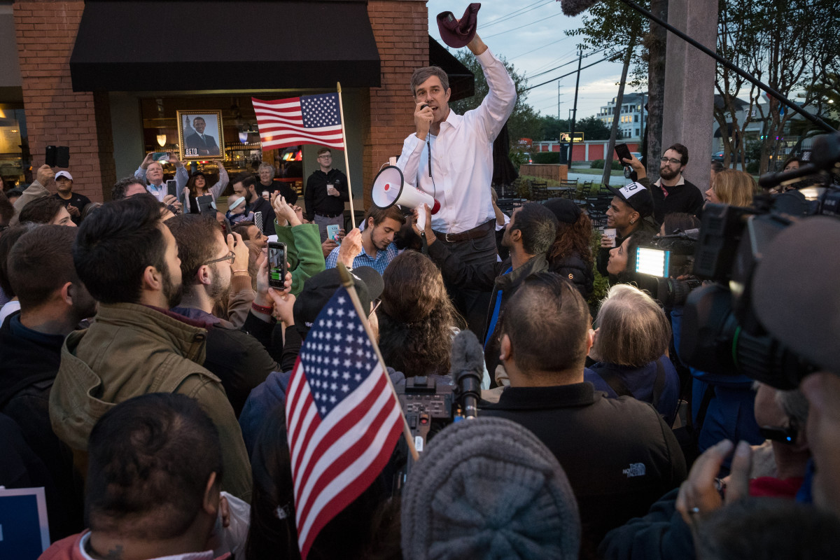 Democratic Senate candidate Beto O'Rourke addresses supporters near a polling place on the first day of early voting on October 22nd, 2018, in Houston, Texas.