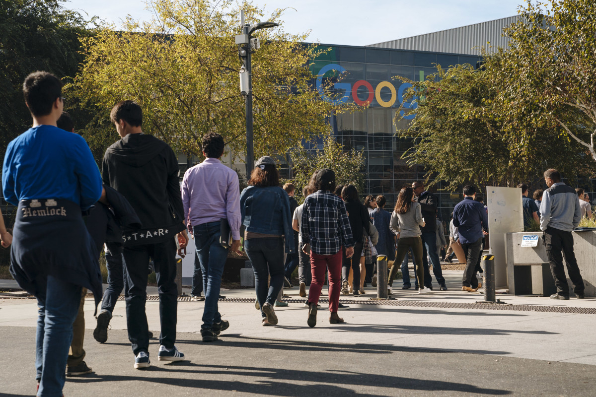Google employees walk off the job to protest the company's handling of sexual misconduct claims, on November 1st, 2018, in Mountain View, California. Employees staged walkouts at offices around the world after a report last week that Google gave $90 million in a severance package to former executive Andy Rubin and covered up details of sexual misconduct allegations against him, which triggered his departure.