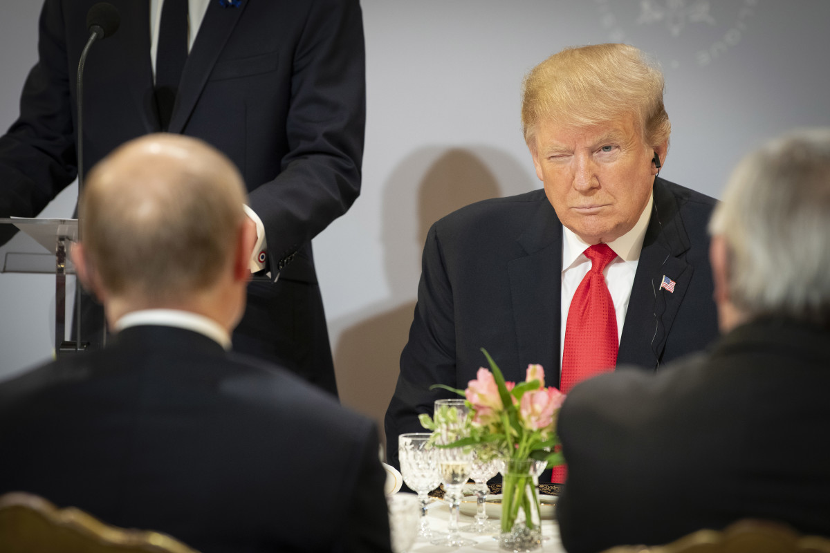 President Donald Trump sits opposite Russian President Vladimir Putin during lunch at the Elysée Palace while commemorating the 100th anniversary of the end of World War I, November 11th, 2018, in Paris, France.
