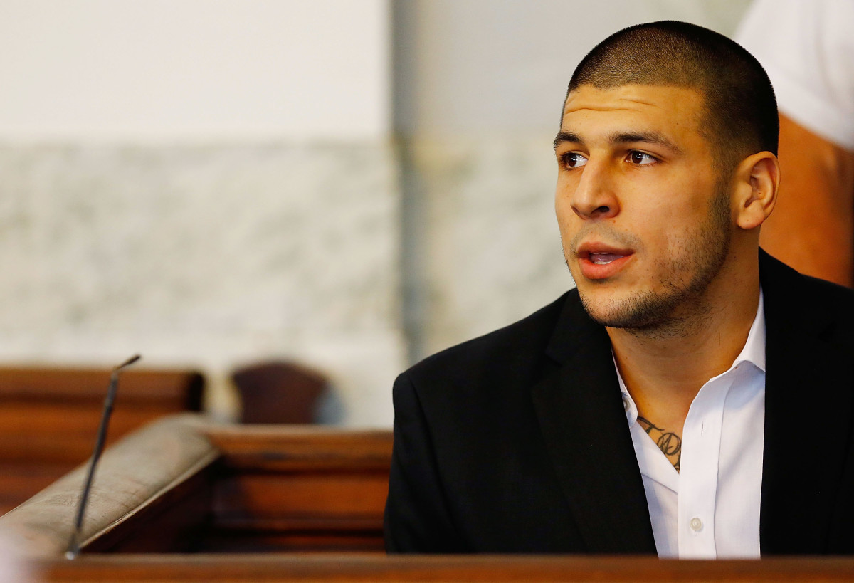 Aaron Hernandez sits in the courtroom of the Attleboro District Court during his hearing on August 22nd, 2013, in North Attleboro, Massachusetts.