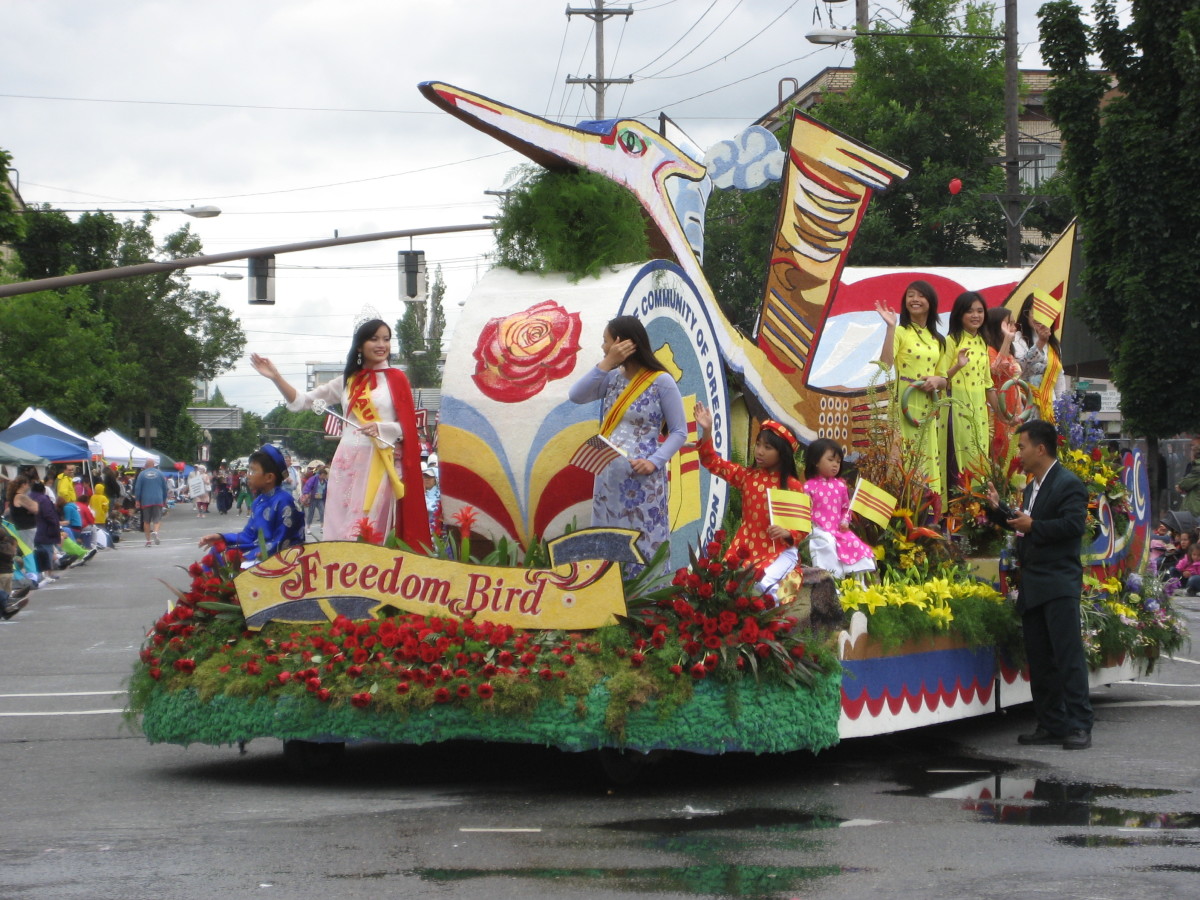 Members of the Vietnamese community celebrate on a float at the Portland Rose Festival parade.
