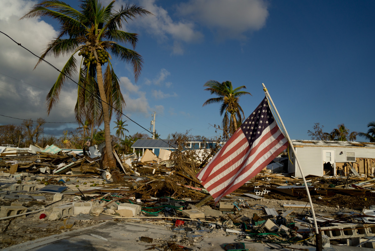 An American flag flies amid the destruction in the Sea Breeze trailer park in Marathon, Florida, on September 16th, 2017.