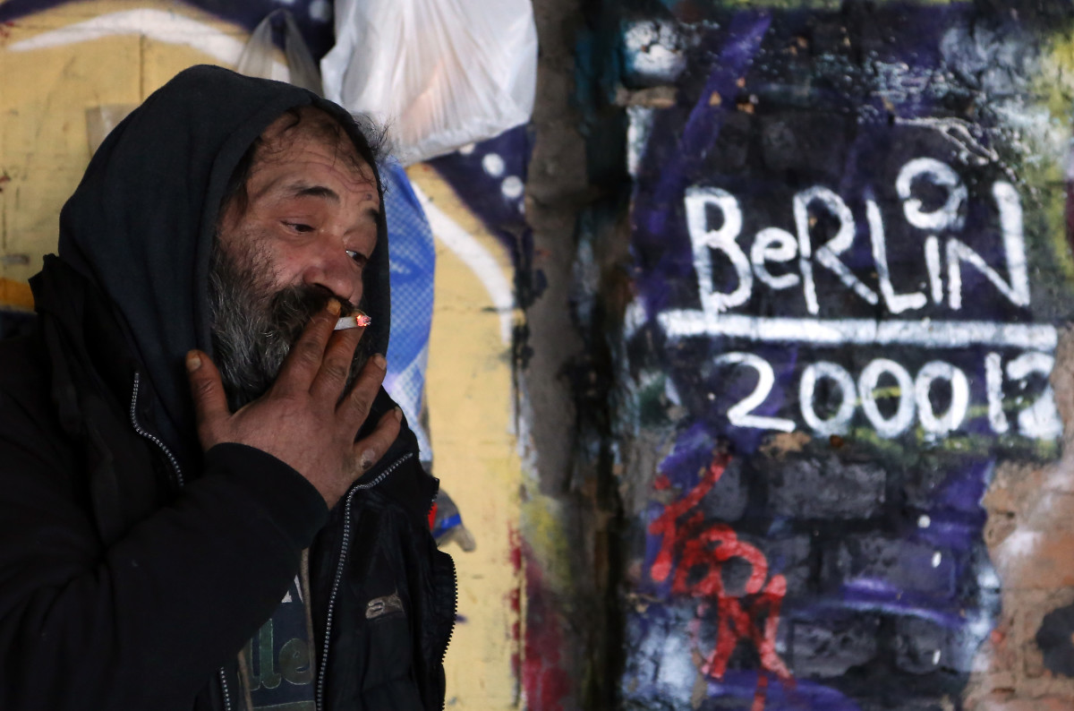 Aladdin Salim, a Roma Muslim from Bulgaria, stands outside of his makeshift shelter in the ruins of a former ice factory known locally as the Eisfabrik on December 27th, 2013, in Berlin, Germany.