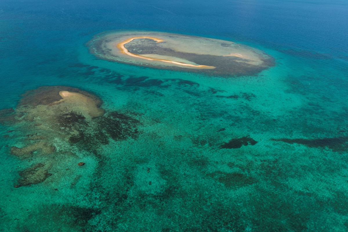 An aerial view taken on February 27th, 2016, shows coral reefs in New Caledonia in the South Pacific.