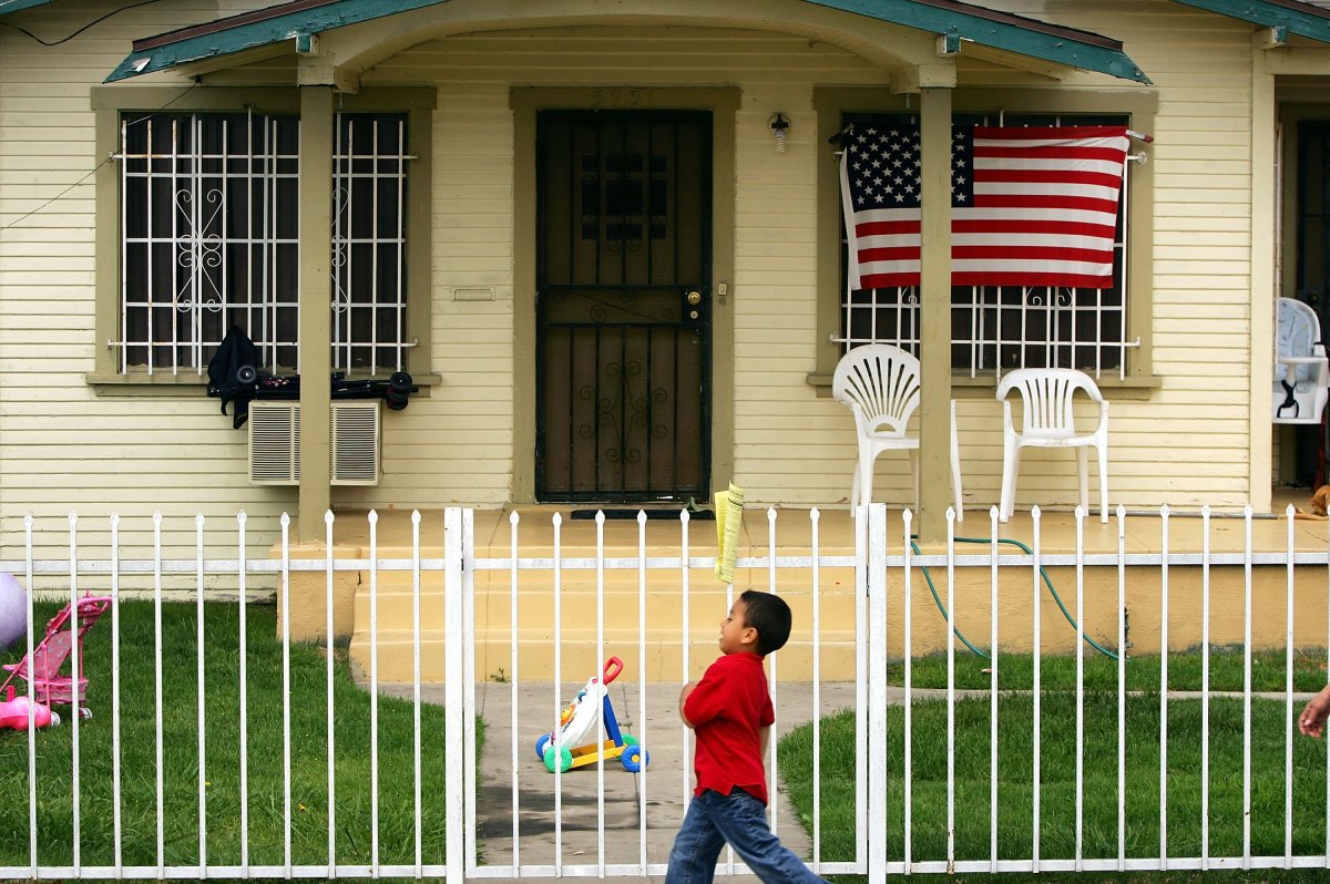 An American flag hangs on a home in Maywood, California.
