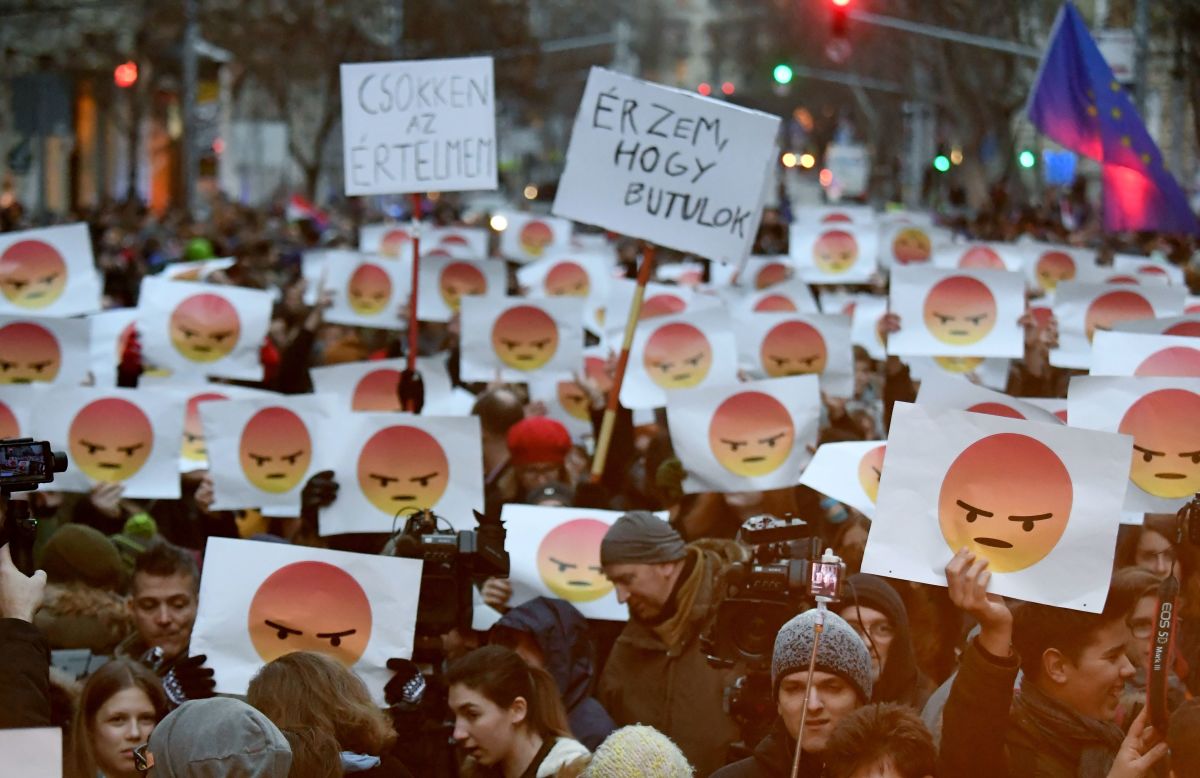 Students hold up signs with angry emoticons to protest against the education policy of the government at the Parliament building in Budapest, Hungary, on January 19th, 2018.