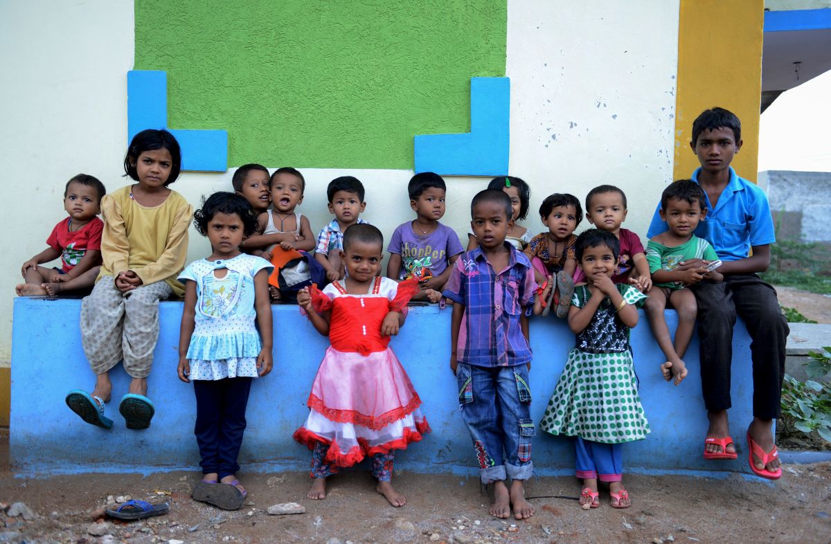 Rohingya Muslim children pose for a photo at a refugee camp in the old city of Hyderabad.