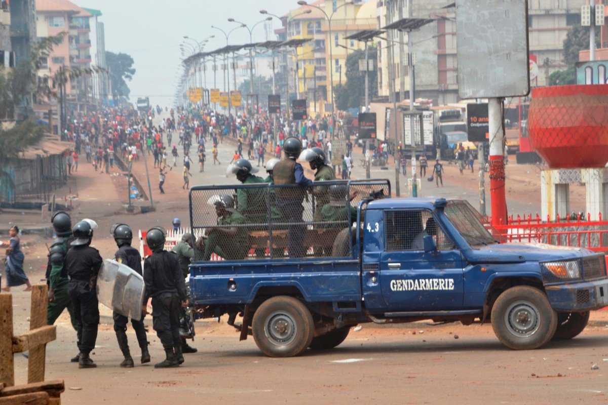 Riot police get ready to disperse people demonstrating to denounce the results of the local elections, on February 6th, 2018, in Conakry, Guinea. Guinean opposition leaders denounced the West African country's long-delayed local elections as fraudulent, citing vote rigging in polling stations across the country.