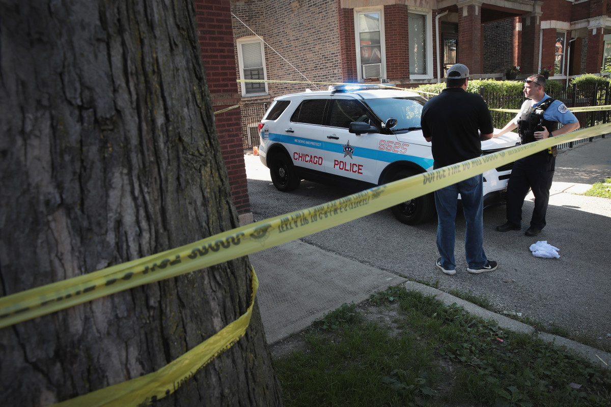 Chicago Police guard evidence near a murder scene in the Humboldt Park neighborhood on July 27th, 2017, in Chicago, Illinois.
