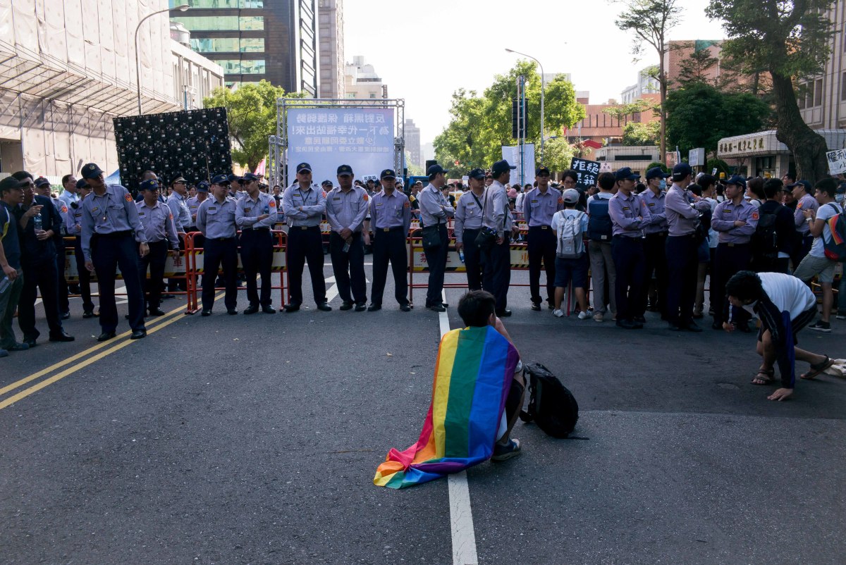 A supporter of same-sex marriage wears a flag during a 2016 protest in Taipei, Taiwan.