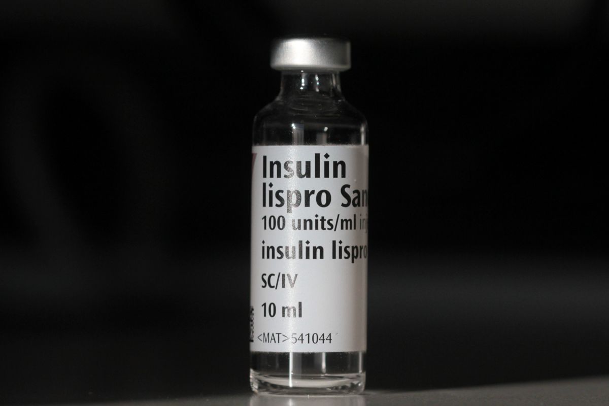 An empty bottle of Insulin lispro by French multinational pharmaceutical company Sanofi is photographed as an arranged illustration in London on February 21, 2019.