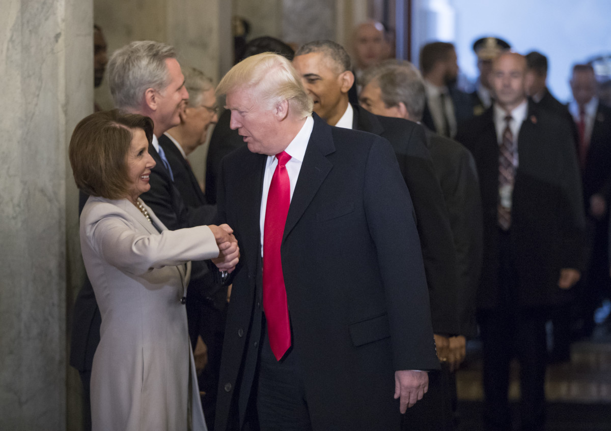 Nancy Pelosi greets Donald Trump ahead of his inauguration ceremony in 2017.
