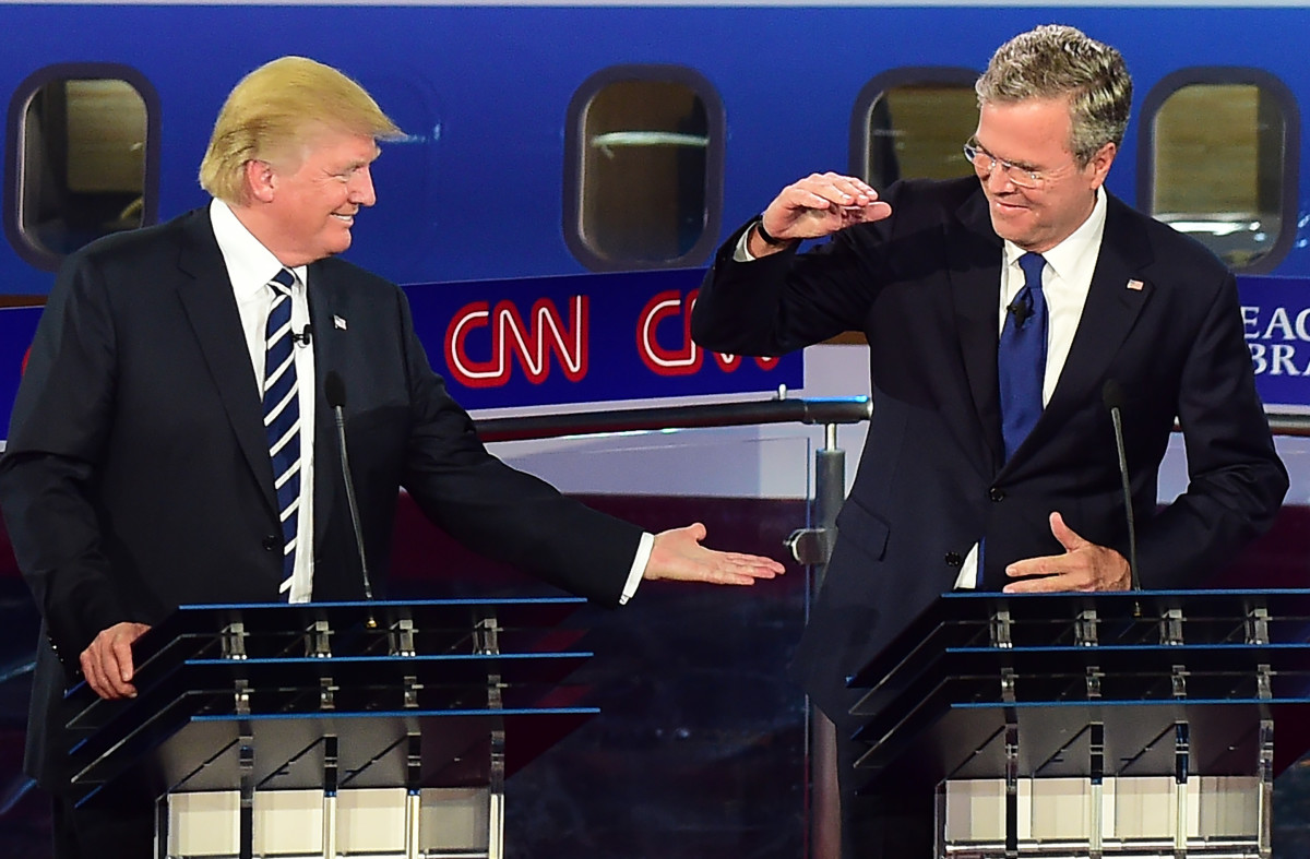Republican presidential hopefuls Donald Trump and Jeb Bush share a moment during the Republican Presidential Debate at the Ronald Reagan Presidential Library in Simi Valley, California, on September 16th, 2015.
