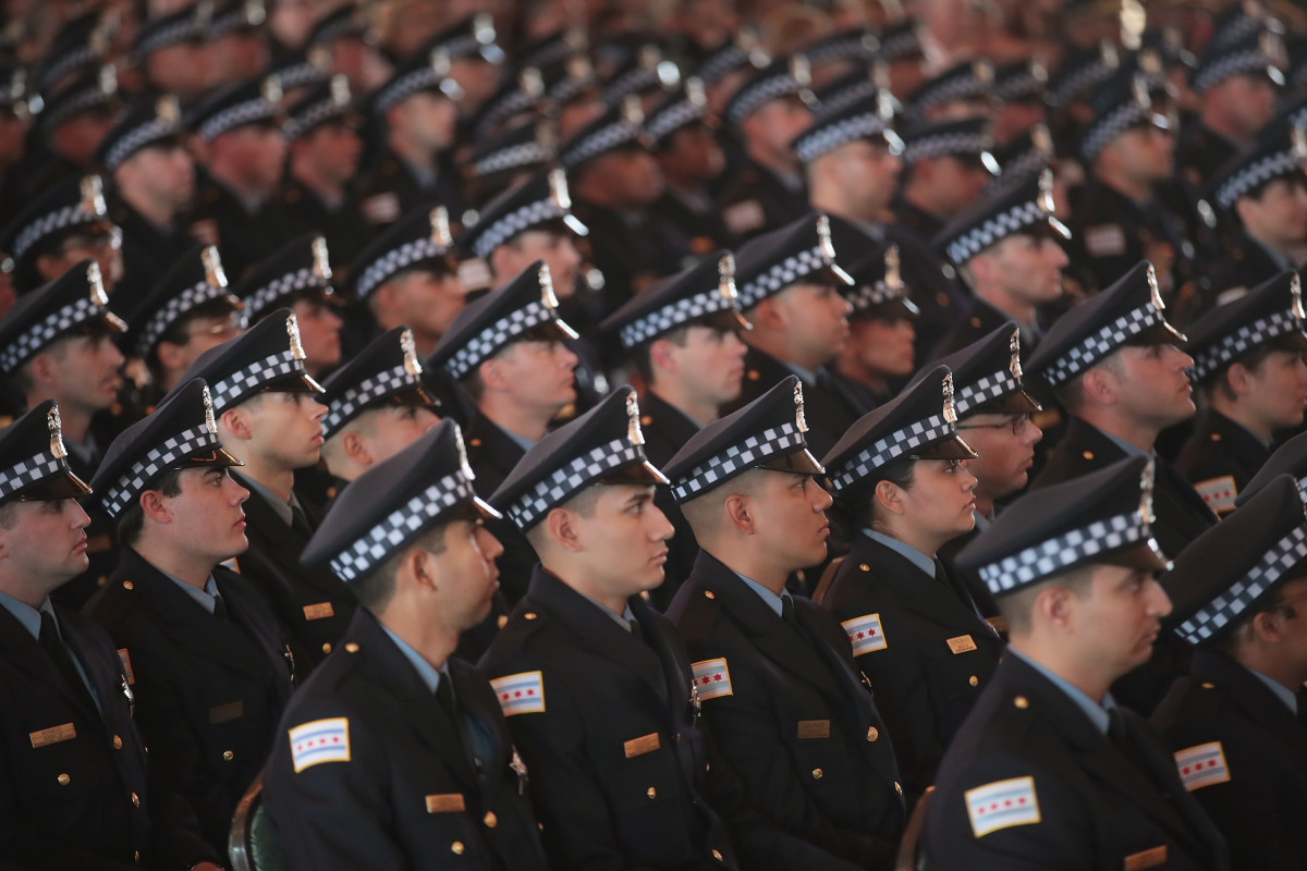 Chicago police officers attend a graduation and promotion ceremony in June of 2017.