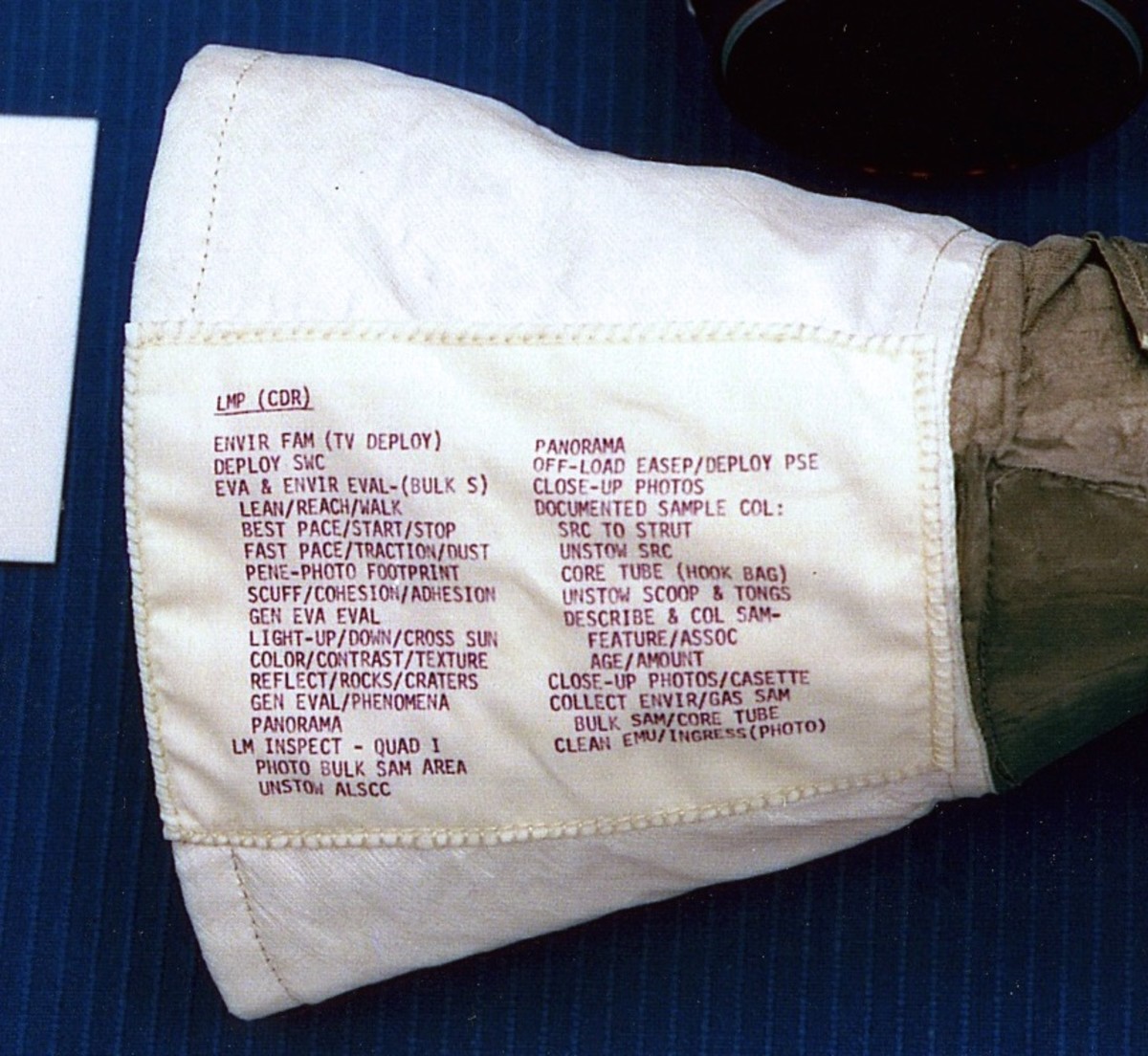This pre-flight photo shows Buzz Aldrin's left glove, including the sewn-on checklist.