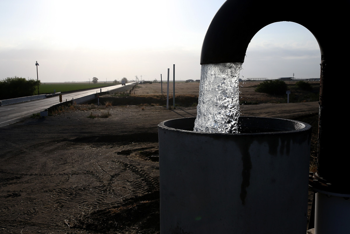 Well water is pumped from the ground on April 24th, 2015, in Tulare, California.