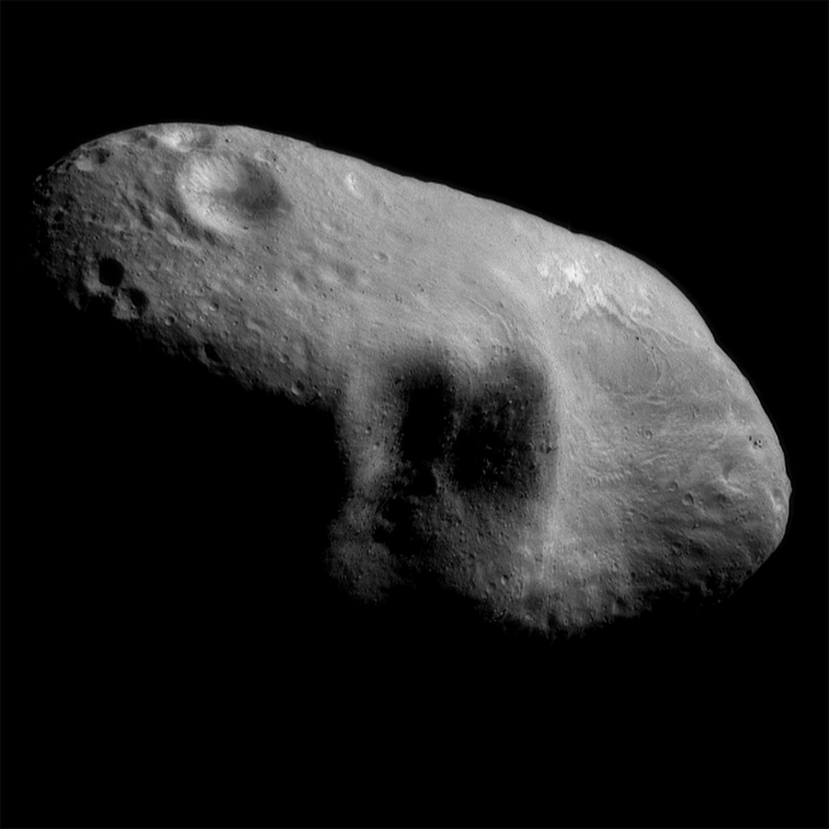 An image mosaic of the asteroid Eros taken by the robotic NEAR Shoemaker space probe on March 3rd, 2000, from a distance of 127 miles.