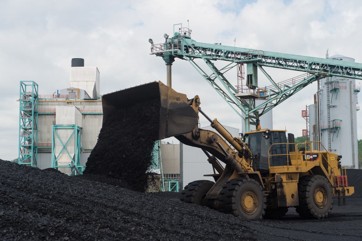 A front-end loader dumps coal at the East Kentucky Power Cooperative's John Sherman Cooper power station near Somerset, Kentucky, on April 19th, 2017.
