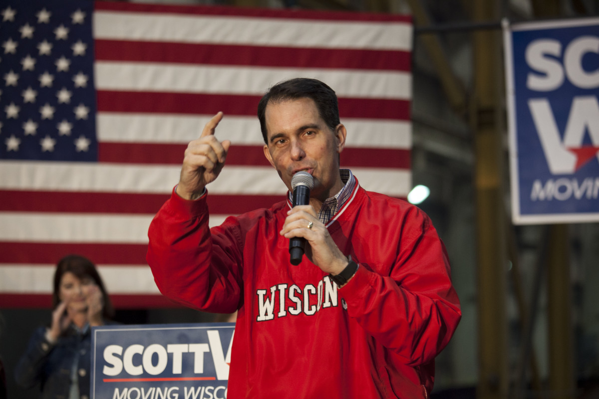 Governor Scott Walker speaks to supporters at a last-minute rally the night before the mid-term elections on November 5th, 2018, in Waukesha, Wisconsin.
