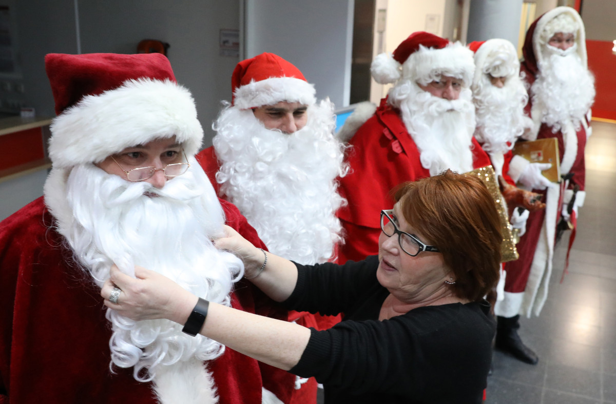 An employee at the job center in the city of Rostock, Germany, inspects candidates for a position at the center's Santa Claus agency on December 11th, 2018.