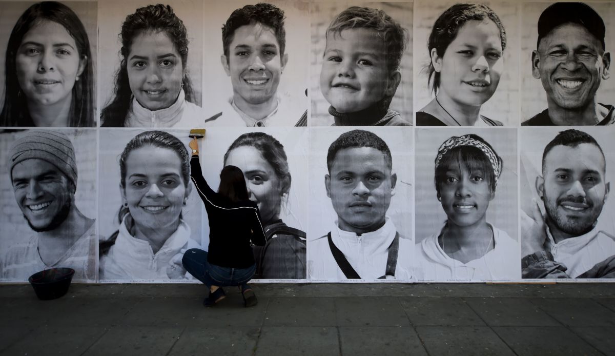 Portraits of Venezuelan migrants and refugees are displayed in Bogota, Colombia, as part of worldwide demonstrations in support of dignity for migrants for International Migrants Day on December 18th, 2018.