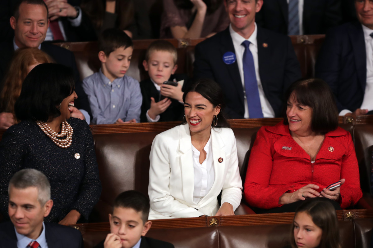 Representative Alexandria Ocasio-Cortez (D-New York) celebrates along with other members of Congress during the first session of the 116th Congress on January 3rd, 2019.