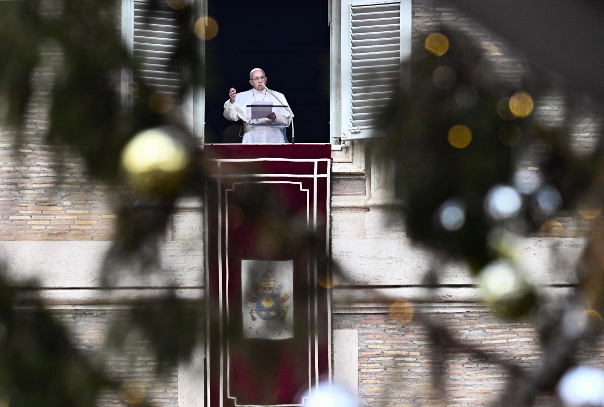 Pope Francis speaks from the window of the Apostolic Palace overlooking St. Peter's Square in the Vatican, during the weekly Angelus prayer, on January 13th, 2019.