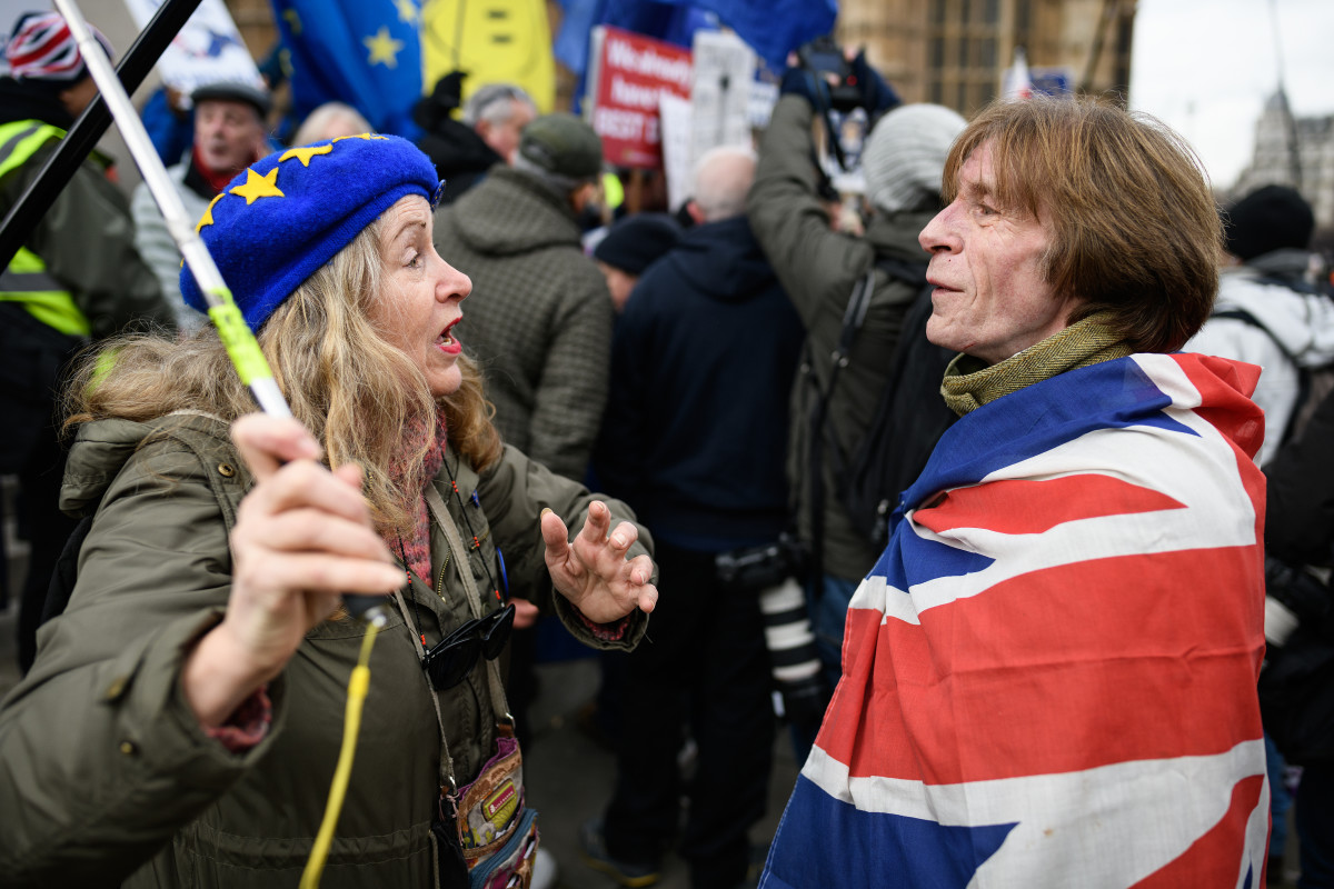 Pro-European Union and pro-Brexit protesters discuss the vote and ongoing political processes as they demonstrate near the Houses of Parliament on January 29th, 2019, in London, England. Members of Parliament debated the amendments to the Prime Minister's Brexit plans in the House of Commons Tuesday afternoon and voted on them Tuesday evening.