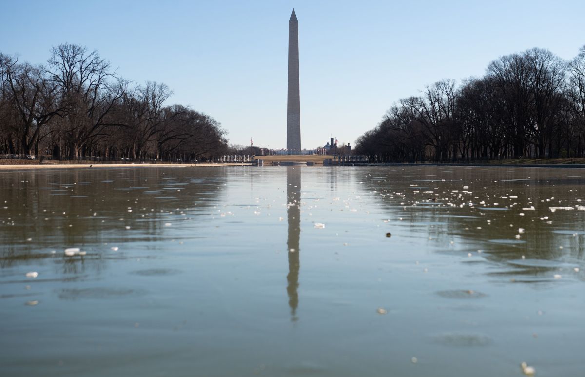 The Reflecting Pool on the National Mall in Washington, D.C., on January 31st, 2019, is frozen as the region experiences frigid cold temperatures from a polar vortex. A brutal cold wave moved eastward Thursday after bringing temperatures in the U.S. Midwest lower than those in Antarctica, grounding flights, closing schools and businesses, and raising fears of hypothermia.