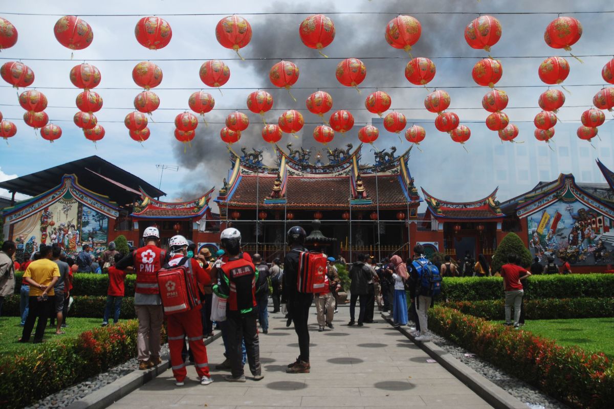 Indonesian firefighters work during a blaze at the Samudera Bhakti and Satya Budhi temple complex on the first day of Lunar New Year in Bandung on February 5th, 2019. No casualties were reported after the temple complex caught fire on the first day of the Lunar New Year.