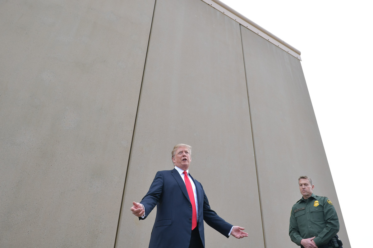 President Donald Trump inspects border wall prototypes with Chief Patrol Agent Rodney S. Scott in San Diego, California, on March 13th, 2018.