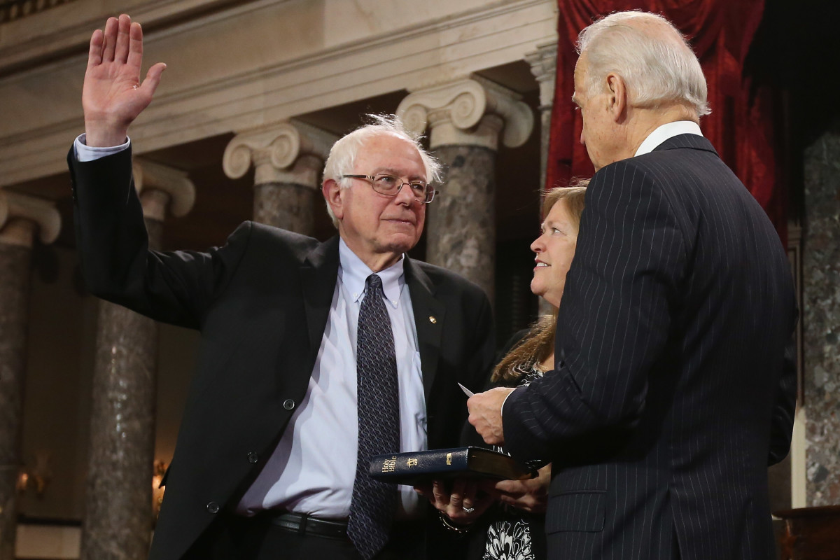 Joe Biden swears in Senator Bernie Sanders (I-Vermont).