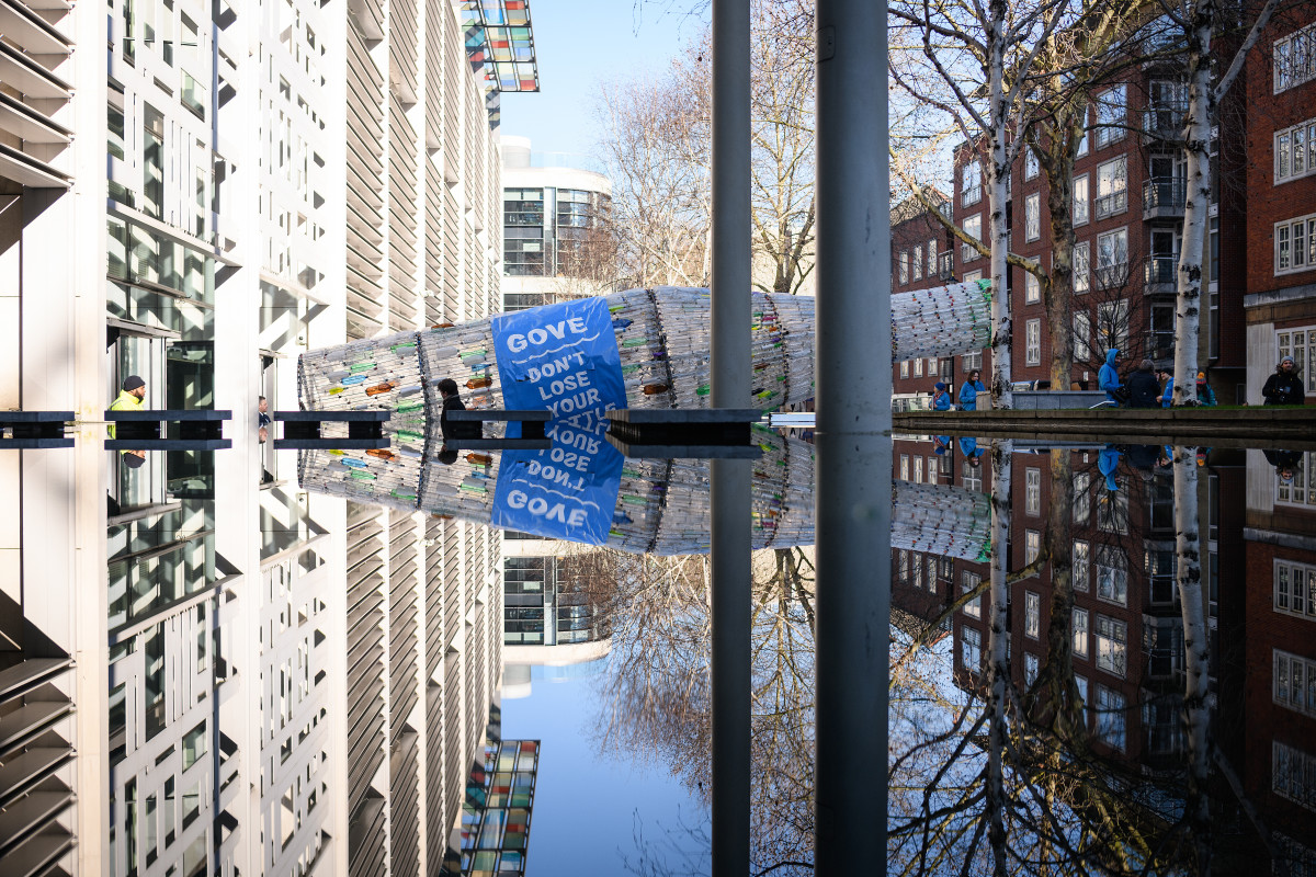 A sculpture made from over 2,500 plastic bottles recovered from beaches, rivers, and streets from around the United Kingdom is seen outside the Department for Environment, Farming and Rural Affairs as part of a stunt by environmental campaign group Greenpeace on February 25th, 2019, in London, England. The sculpture was delivered to DEFRA to apply pressure on Environment Secretary Michael Gove to move forward with a proposed deposit return scheme for bottles and cans bought in the U.K.
