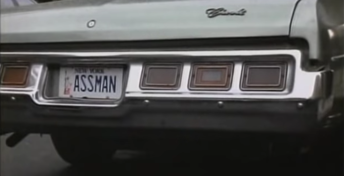 A vanity license plate reading "ASSMAN"