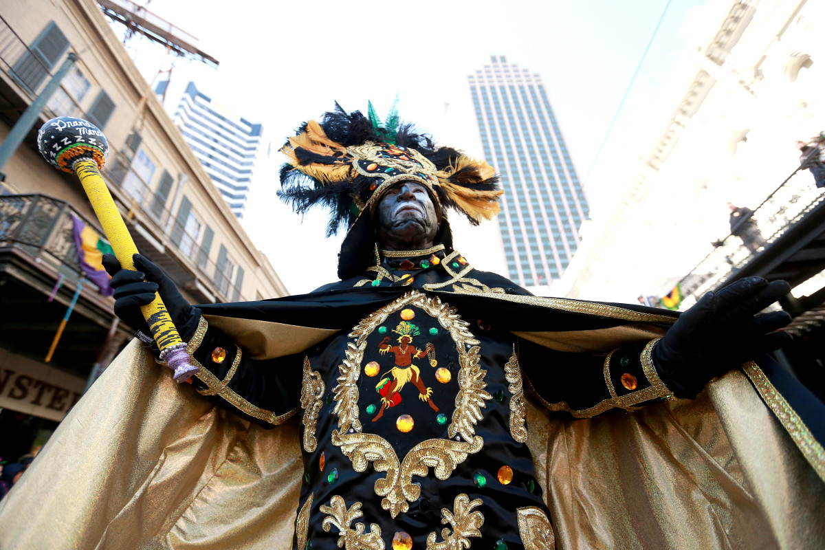 A member of the Zulu Social Aid and Pleasure Club marches down St. Charles Avenue during a Mardi Gras parade on March 5th, 2019, in New Orleans, Louisiana. Mardi Gras, also called Shrove Tuesday, Carnival Tuesday, or Pancake Day, is associated with Carnival celebrations in New Orleans, Rio de Janeiro, and around the world.