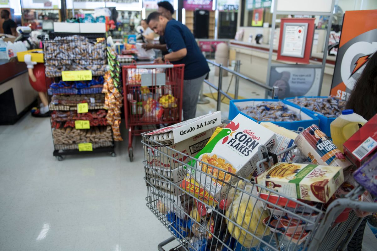 People shop at a Food Town grocery store during the aftermath of Hurricane Harvey on August 30th, 2017, in Houston, Texas.