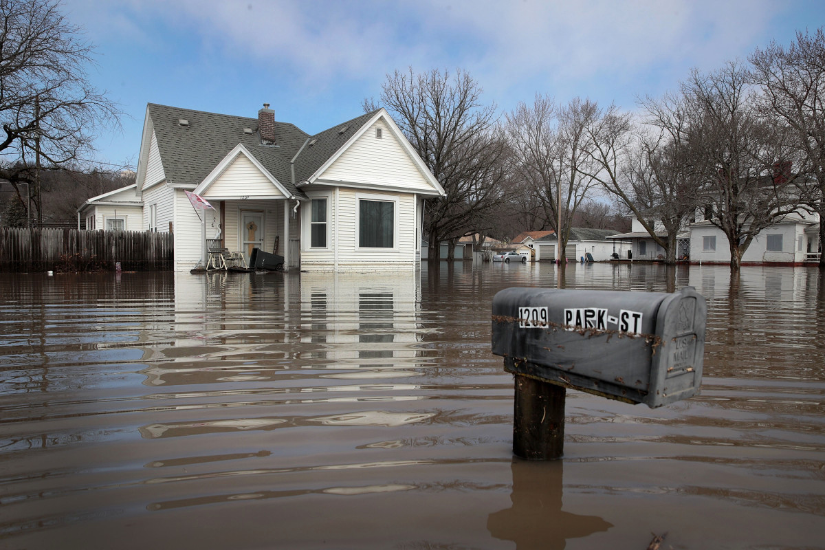 A home sits in floodwater on March 20th, 2019, in Hamburg, Iowa.